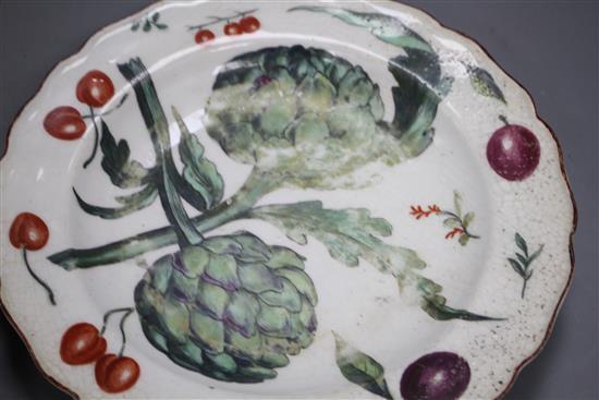 A Chelsea red anchor artichoke plate and a similar fruit and butterfly plate, c.1755, 21.8 and 22cm